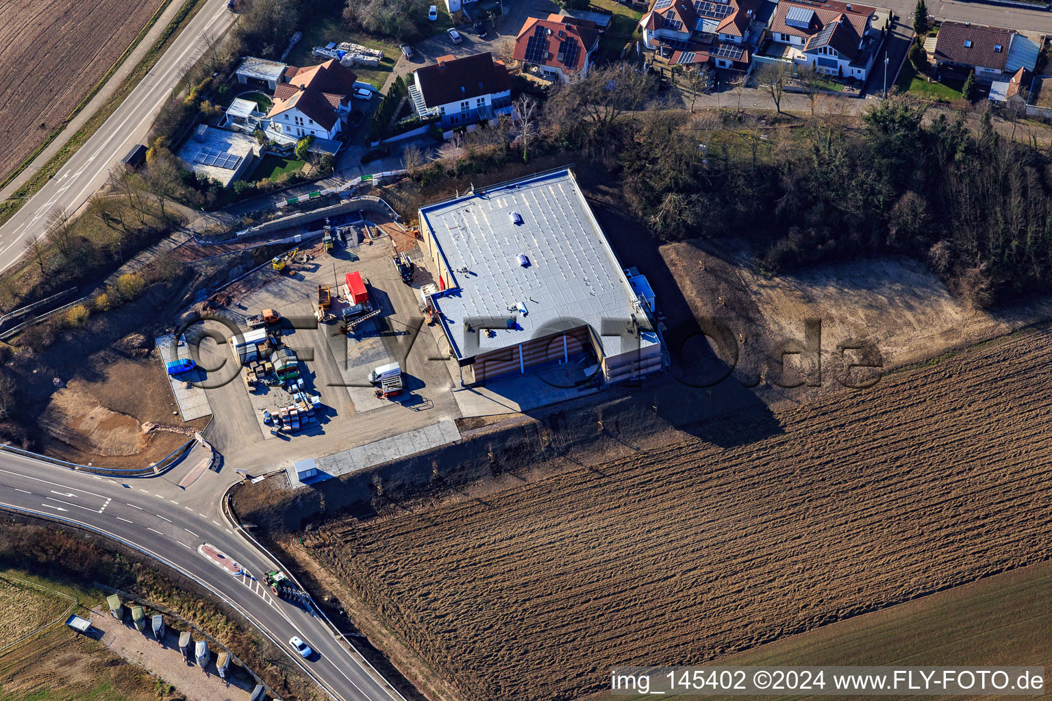 Aerial view of Construction site of the new REWE market in Neupotz in the state Rhineland-Palatinate, Germany