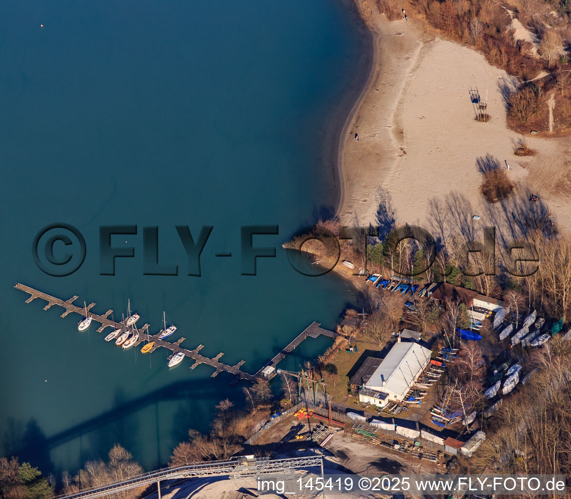 Boat dock at the quarry lake in the district Liedolsheim in Dettenheim in the state Baden-Wuerttemberg, Germany