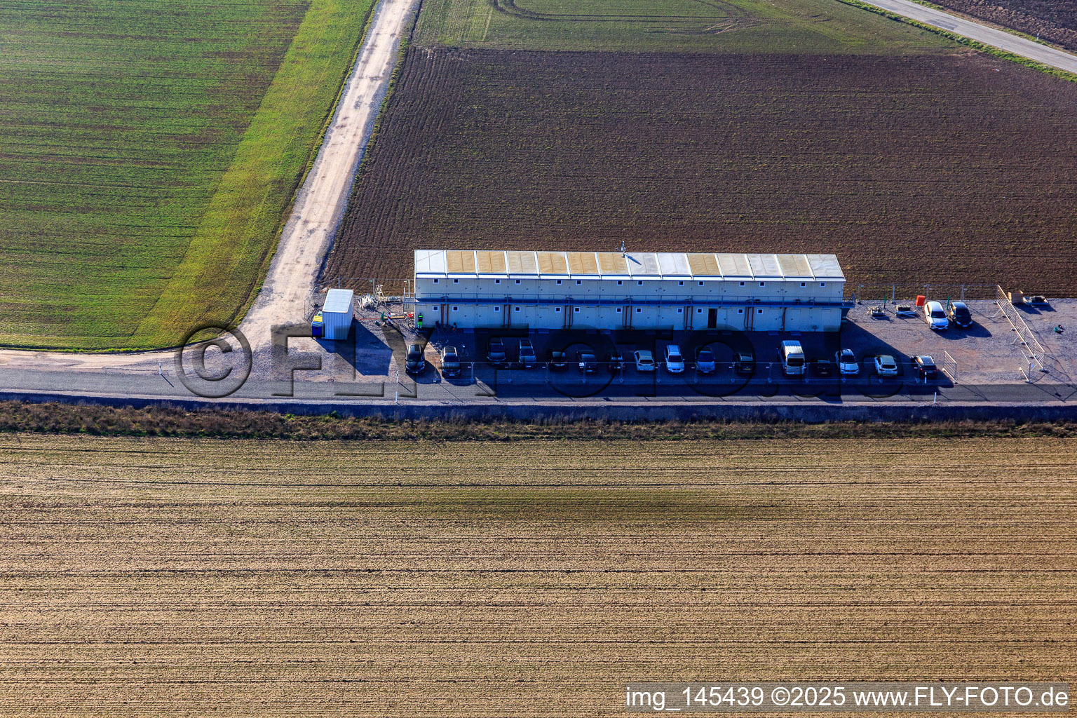Residential containers at the V20 deep drilling site of Vulcan Energy at Schleidberg for the extraction of geothermal energy and lithium in Insheim in the state Rhineland-Palatinate, Germany