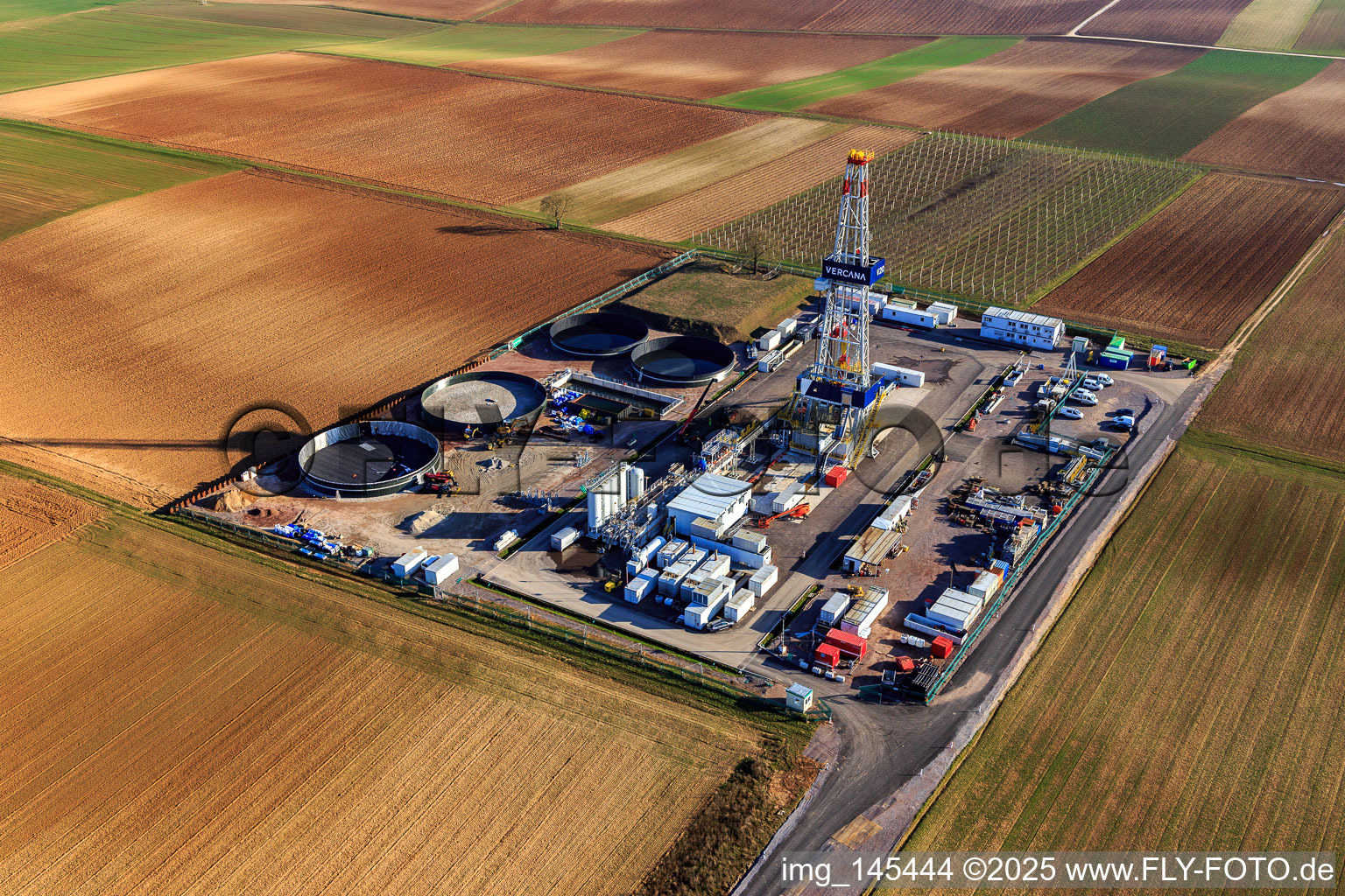 Drilling rig of the V20 deep drilling site of Vulcan Energy at Schleidberg for the extraction of geothermal energy and lithium in Insheim in the state Rhineland-Palatinate, Germany out of the air