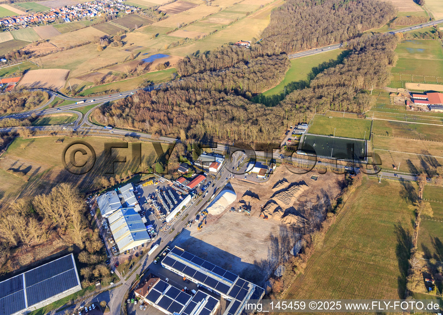 Construction site for the development of the new logistics park of HANSAINVEST and DFI-Real-Estate Kandel after demolition of the OBI market in the district Minderslachen in Kandel in the state Rhineland-Palatinate, Germany from the plane