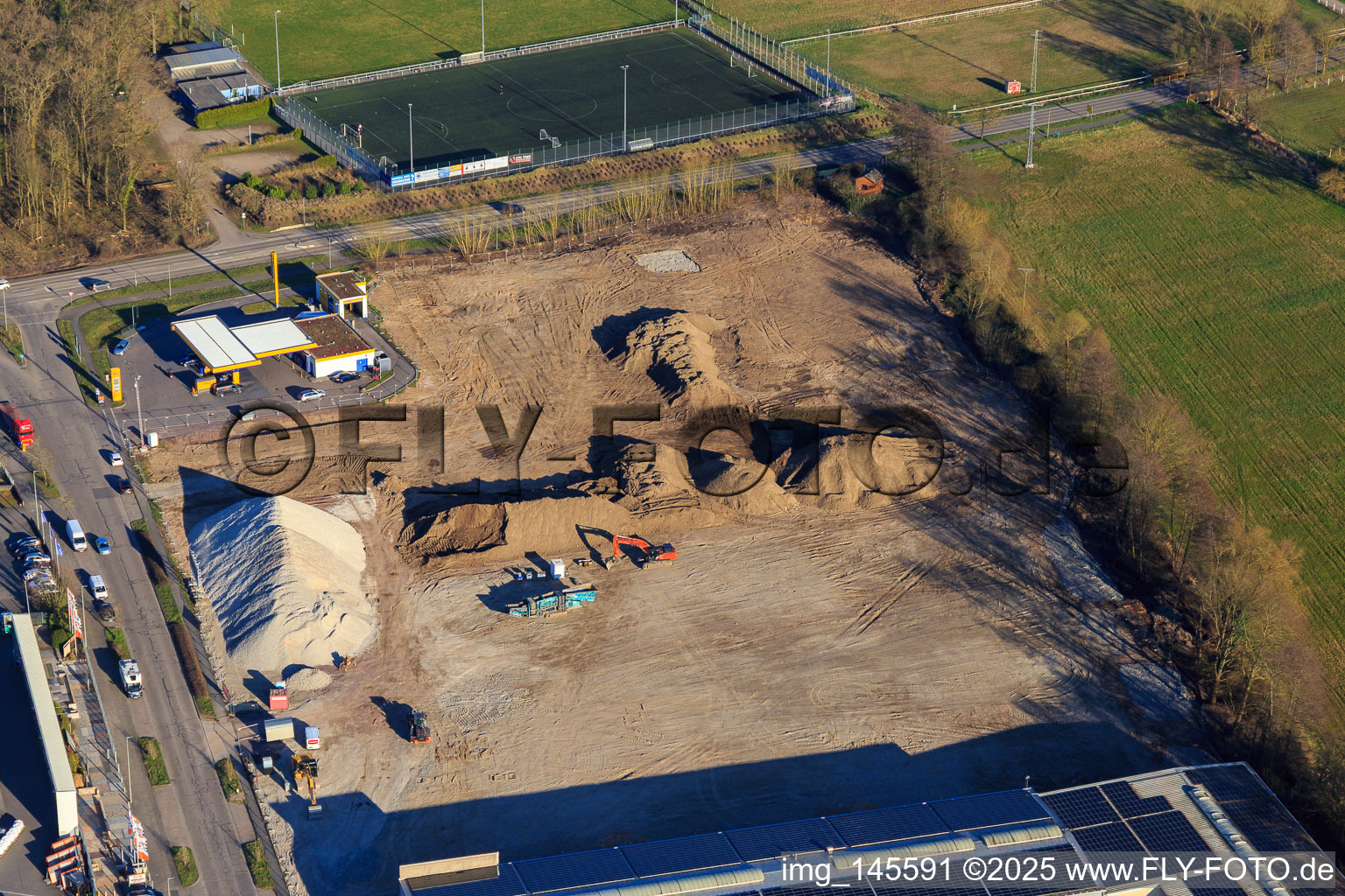Construction site for the development of the new logistics park of HANSAINVEST and DFI-Real-Estate Kandel after demolition of the OBI market in the district Minderslachen in Kandel in the state Rhineland-Palatinate, Germany viewn from the air