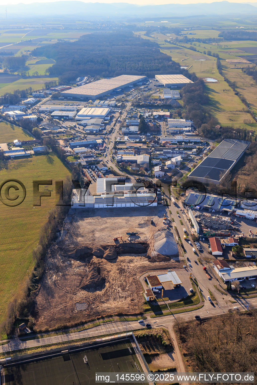 Construction site for the development of the new logistics park of HANSAINVEST and DFI-Real-Estate Kandel after demolition of the OBI market in the district Minderslachen in Kandel in the state Rhineland-Palatinate, Germany from the drone perspective