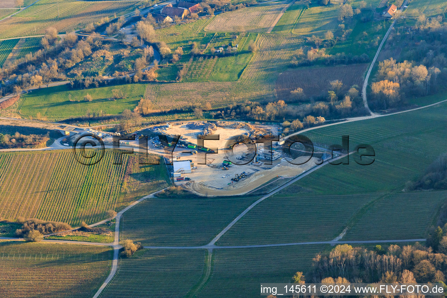 Construction site of the eastern tunnel portal for the Astrid Tunnel for the underpass and bypass of Bad Bergzabern between B38 (Weinstraße) and B427 (Kurtalstraße) in Dörrenbach in the state Rhineland-Palatinate, Germany from a drone