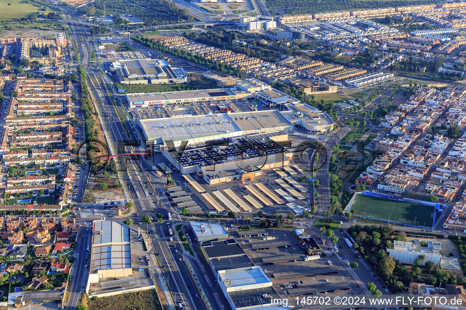 Carrefour, WAY Dos Hermanas and KiK supermarkets on Av. 4 de Diciembre in Dos Hermanas in the state Seville, Spain