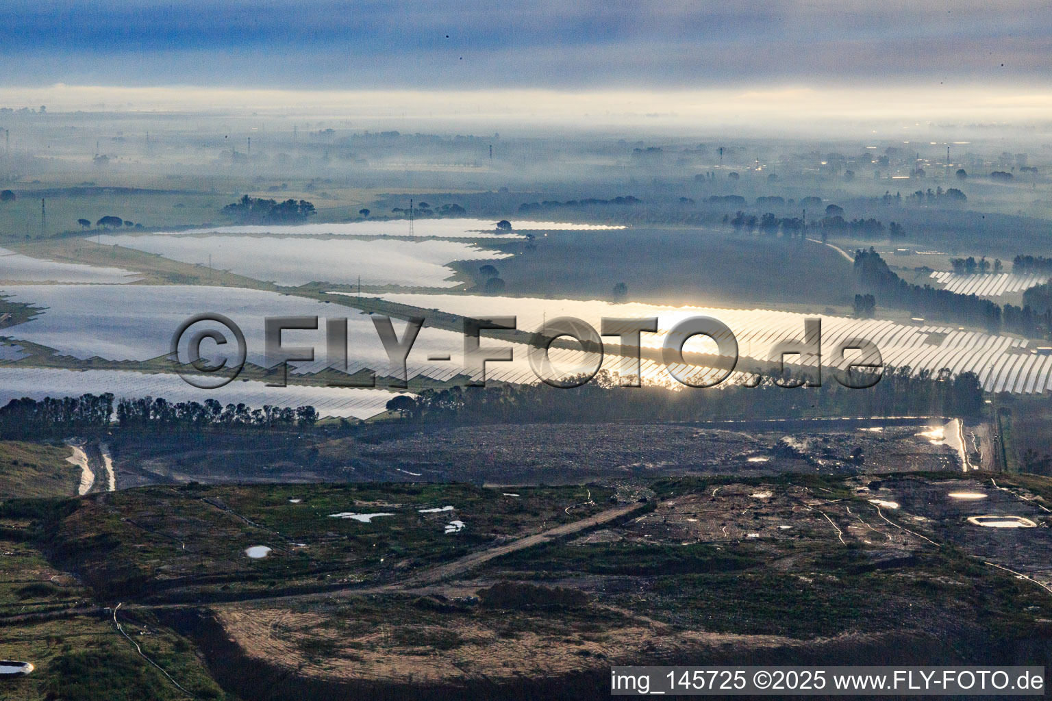 Oblique view of Huge photovoltaic solar power plant PFV DON RODRIGO at the waste incineration plant in Alcalá de Guadaíra in the state Seville, Spain