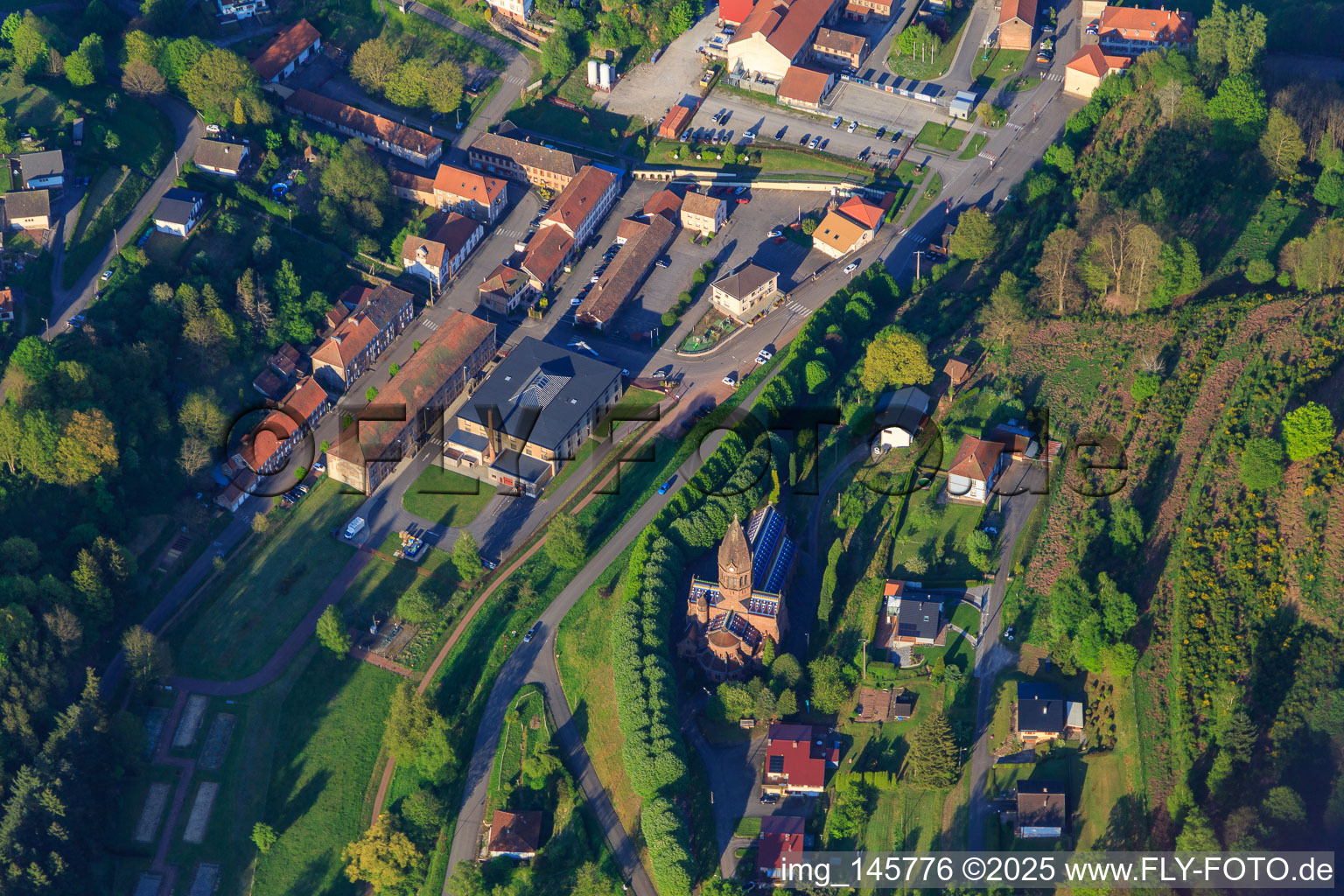 Post office and town hall in the village center in Saint-Louis-lès-Bitche in the state Moselle, France