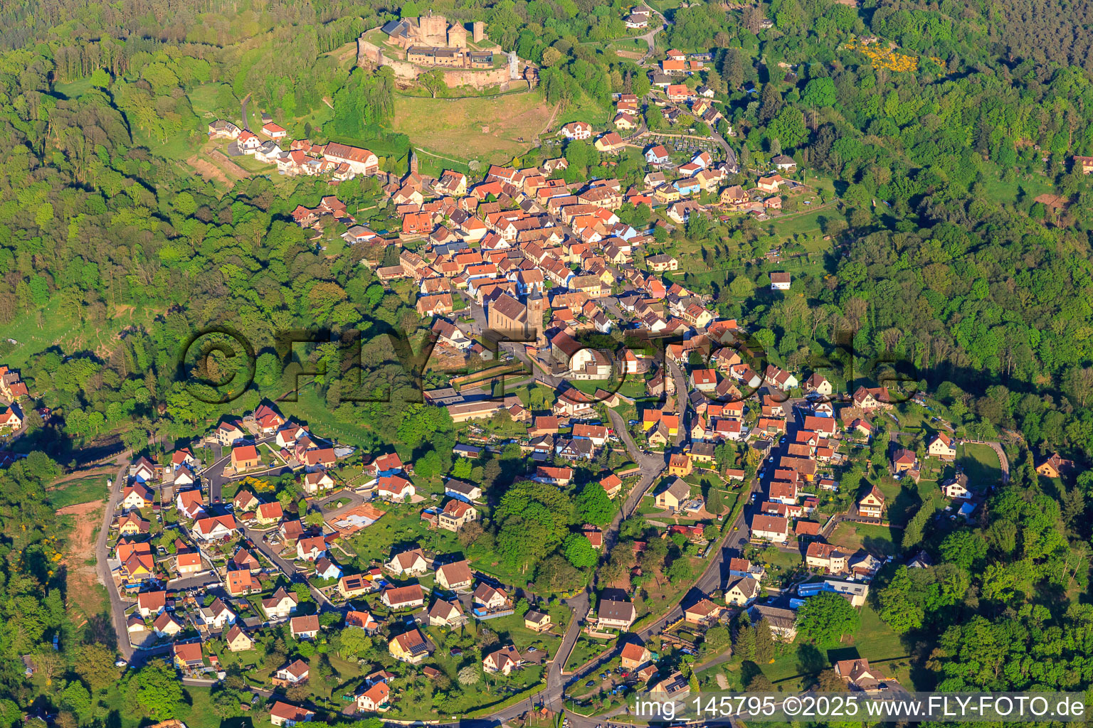 Aerial photograpy of View of the village in the Northern Vosges from the west below the Château de Lichtenberg in Lichtenberg in the state Bas-Rhin, France