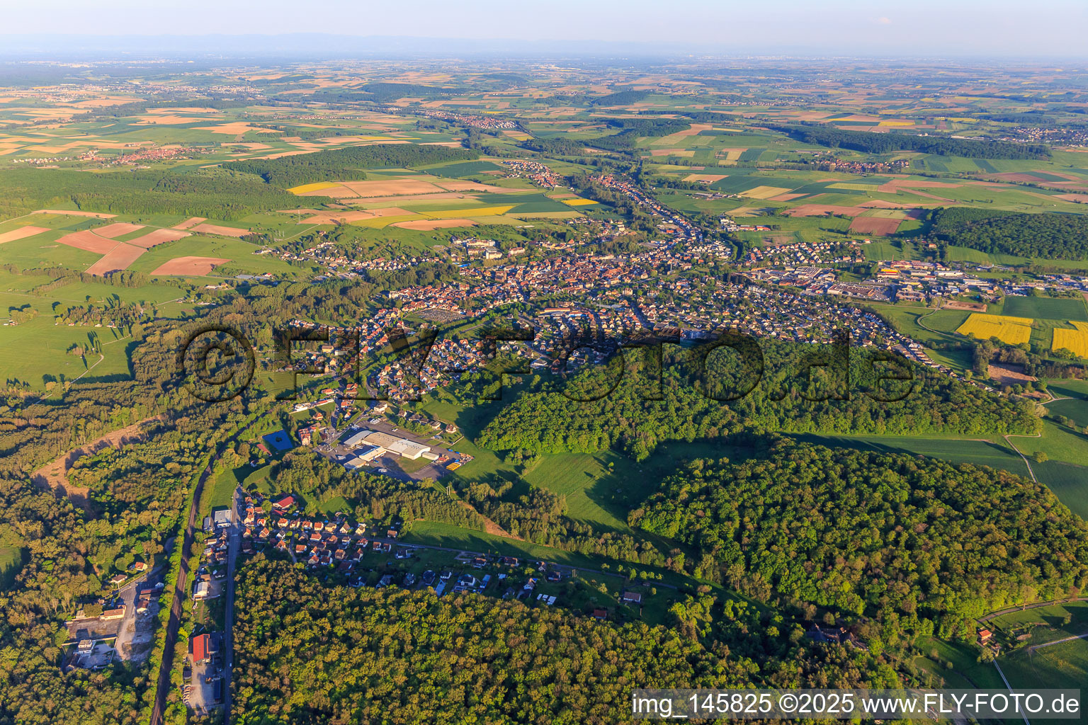 View of the village on the edge of the Northern Vosges from the northwest in Ingwiller in the state Bas-Rhin, France
