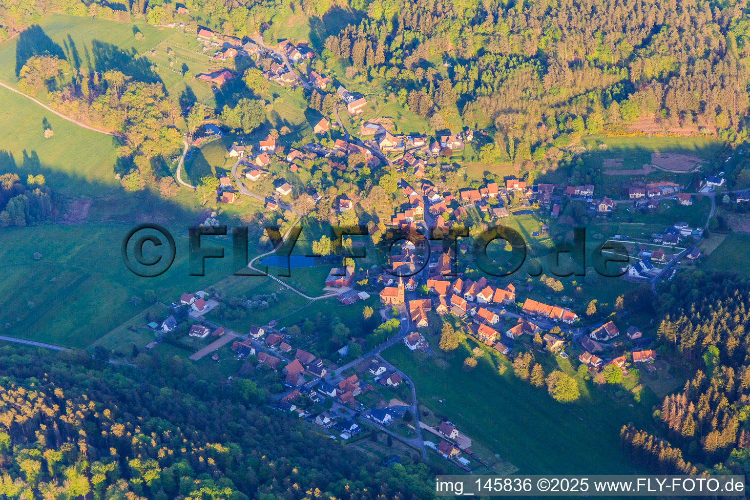 Village view in the Northern Vosges from the north in Zittersheim in the state Bas-Rhin, France