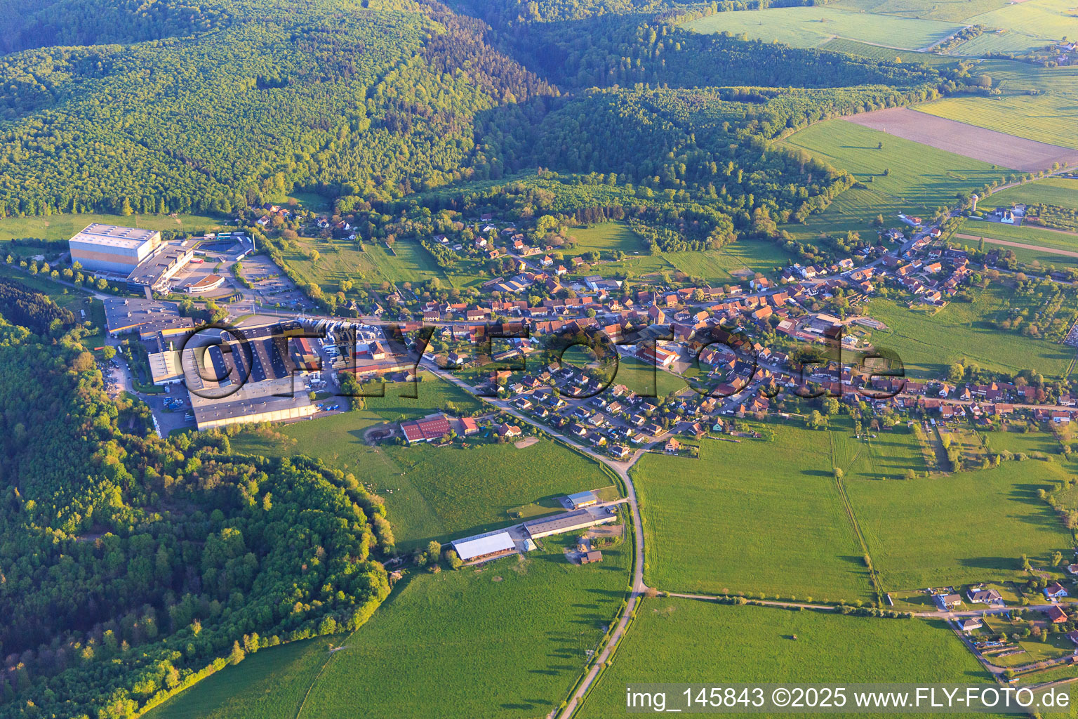 View of the village on the edge of the Northern Vosges from the north in Petersbach in the state Bas-Rhin, France