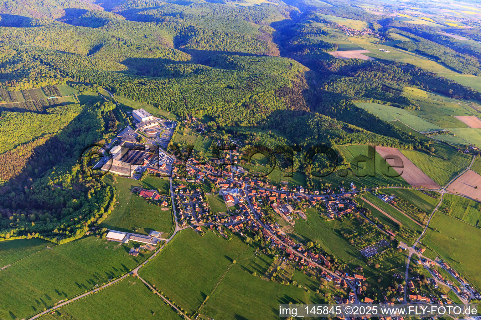 Aerial view of View of the village on the edge of the Northern Vosges from the north in Petersbach in the state Bas-Rhin, France