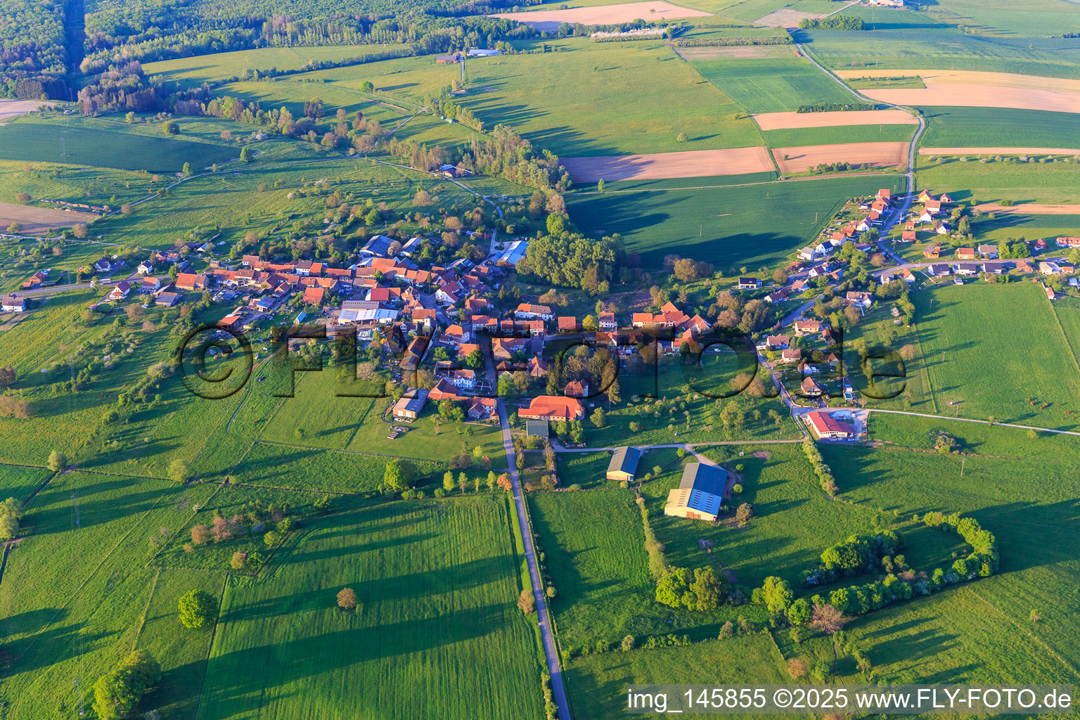 Village view from the southwest in Asswiller in the state Bas-Rhin, France