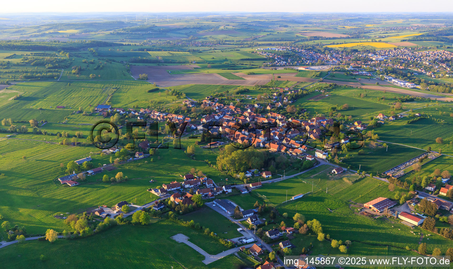 Aerial view of Village view from the southwest in Mackwiller in the state Bas-Rhin, France