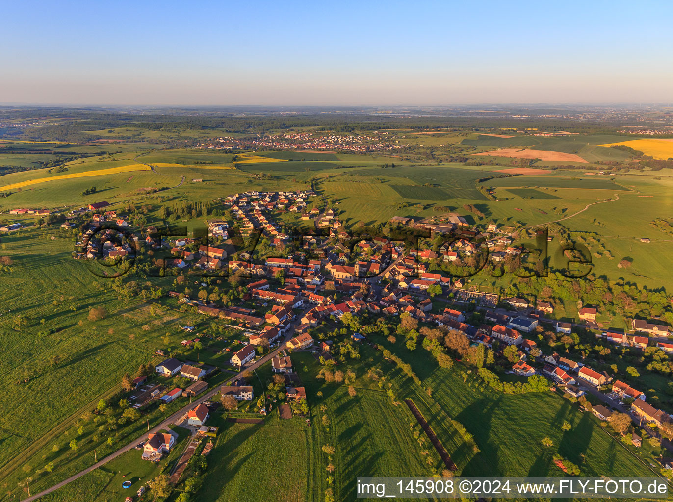 Village overview in the morning from the northeast in Kalhausen in the state Moselle, France
