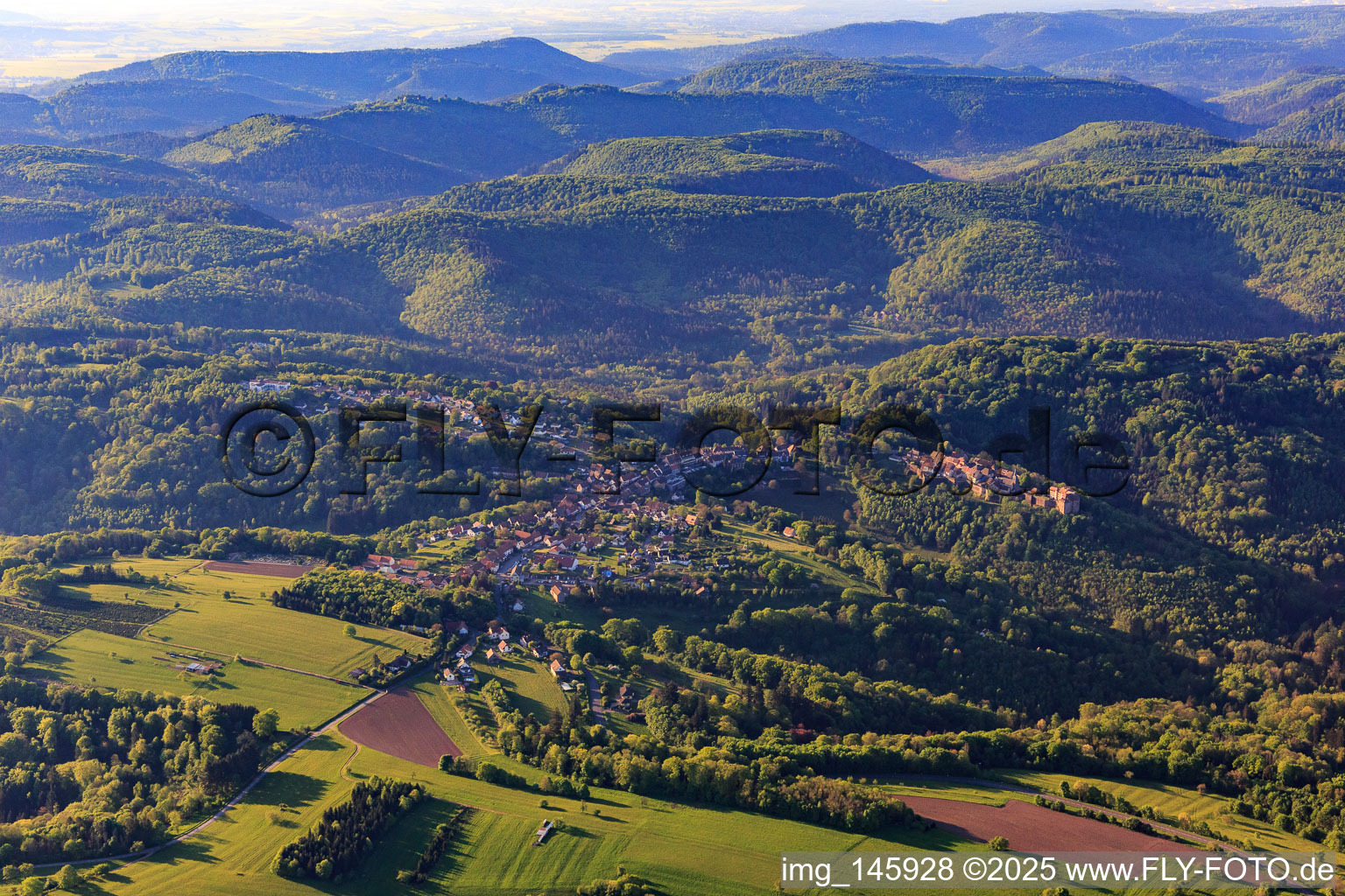 Aerial view of View of the hilly Alsace region of the Northern Vosges with Lützelstein Castle / Château de La Petite-Pierre in the morning from the north in La Petite-Pierre in the state Bas-Rhin, France