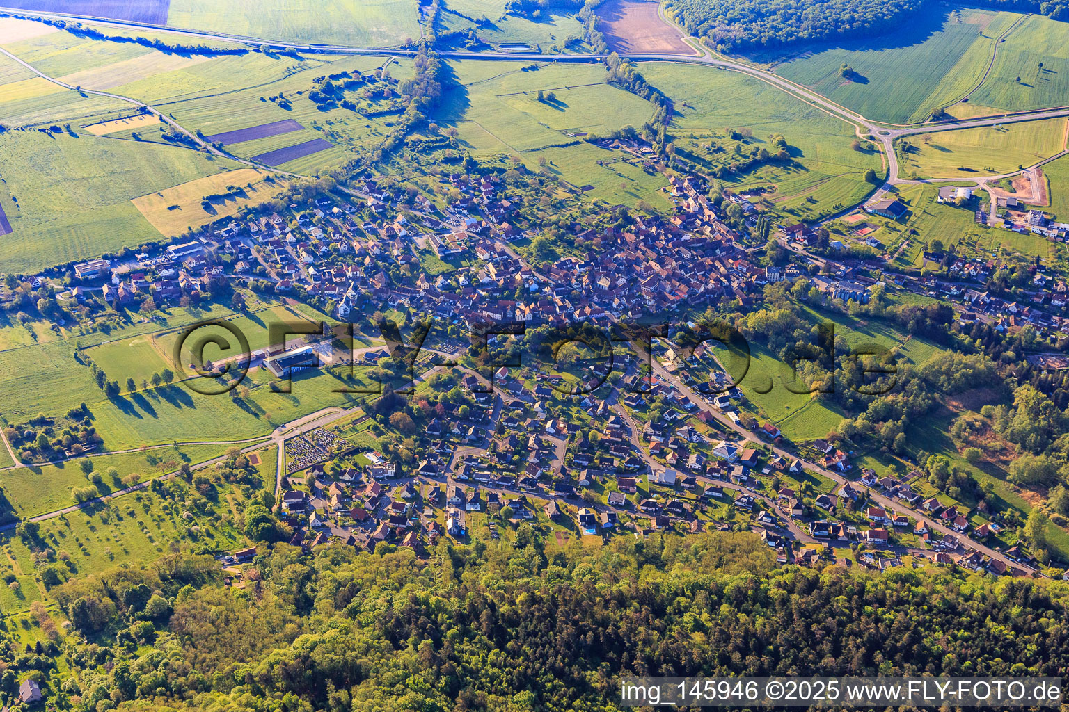 View of the village on the edge of the Northern Vosges from the west in Dossenheim-sur-Zinsel in the state Bas-Rhin, France