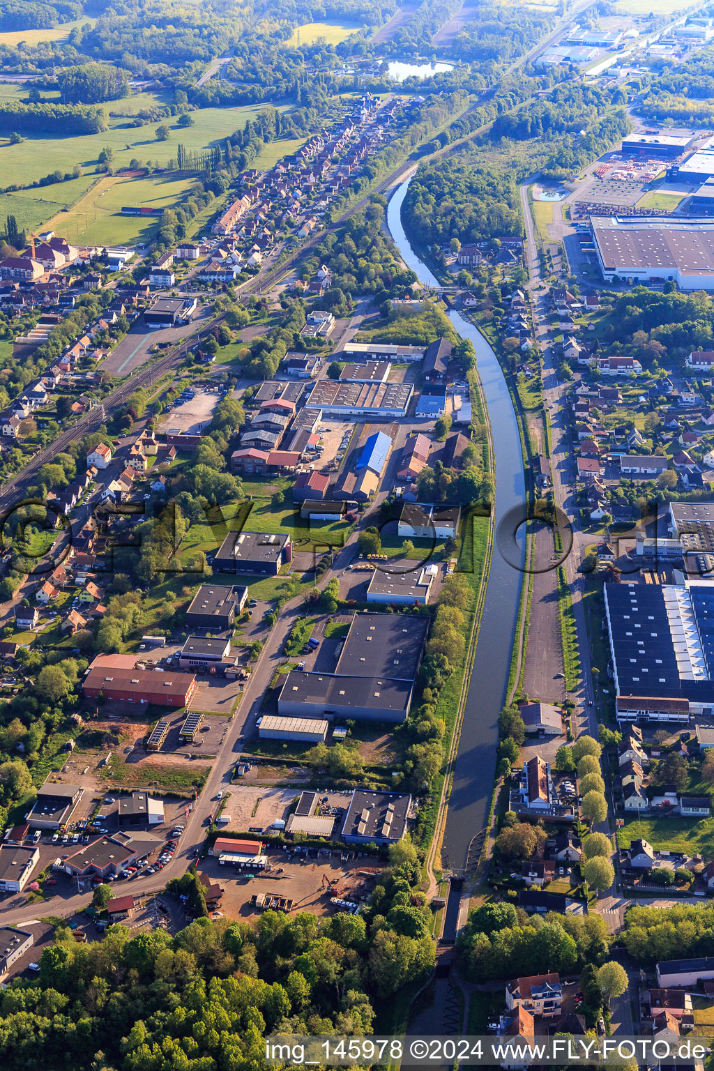 Course of the Canal de la Marne au Rhin (German Rhine-Marne Canal) in the industrial area in Monswiller in the state Bas-Rhin, France
