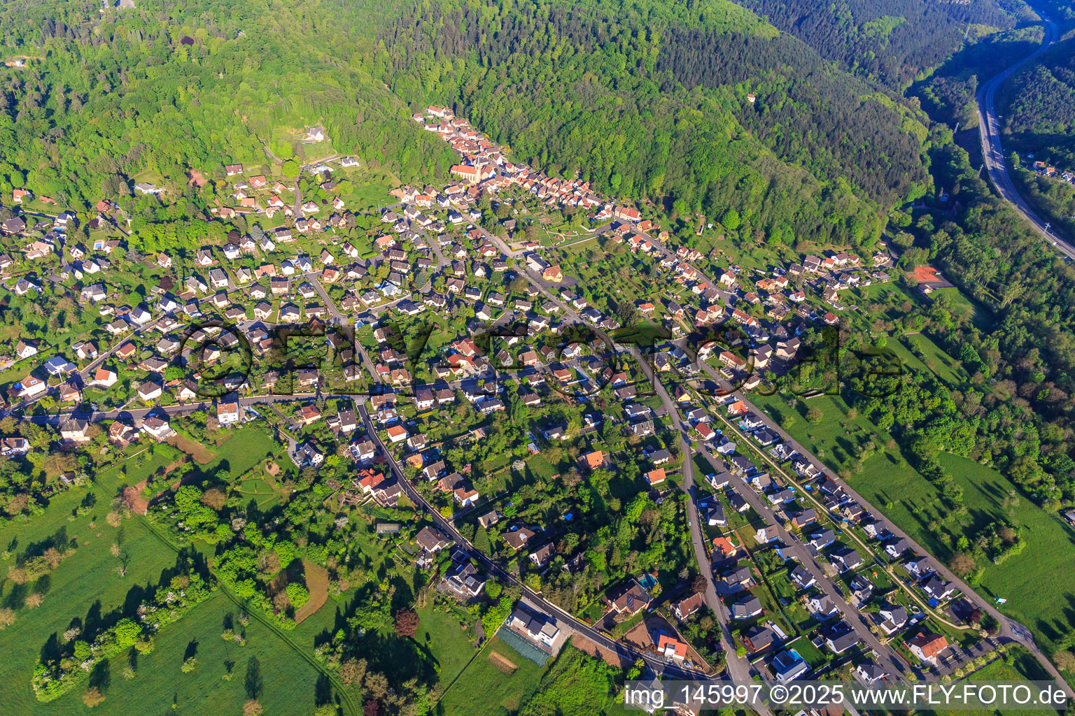 View of the village on the edge of the Northern Vosges from the southeast in Ottersthal in the state Bas-Rhin, France