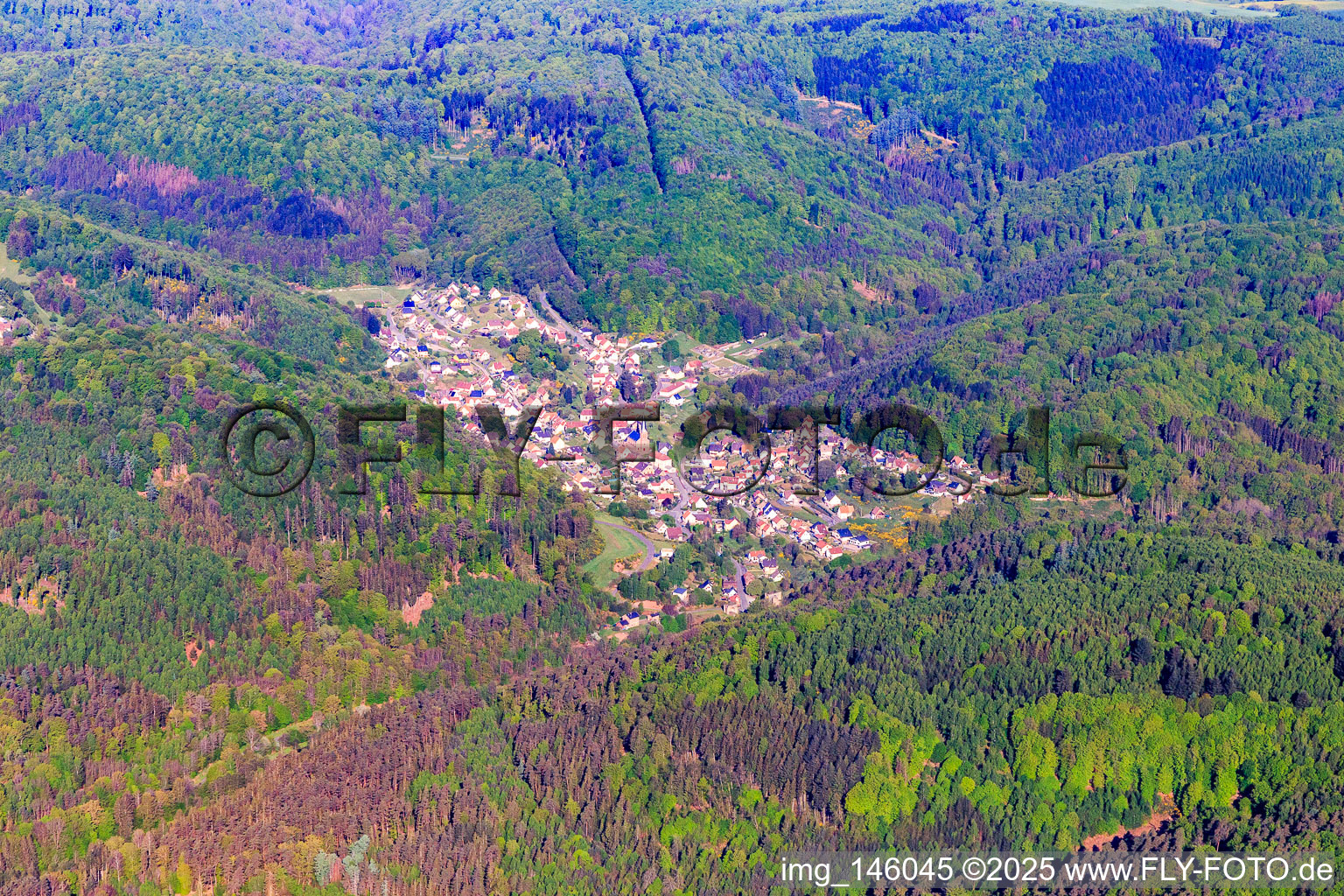 Village view in the Northern Vogense from the east in Rosteig in the state Bas-Rhin, France