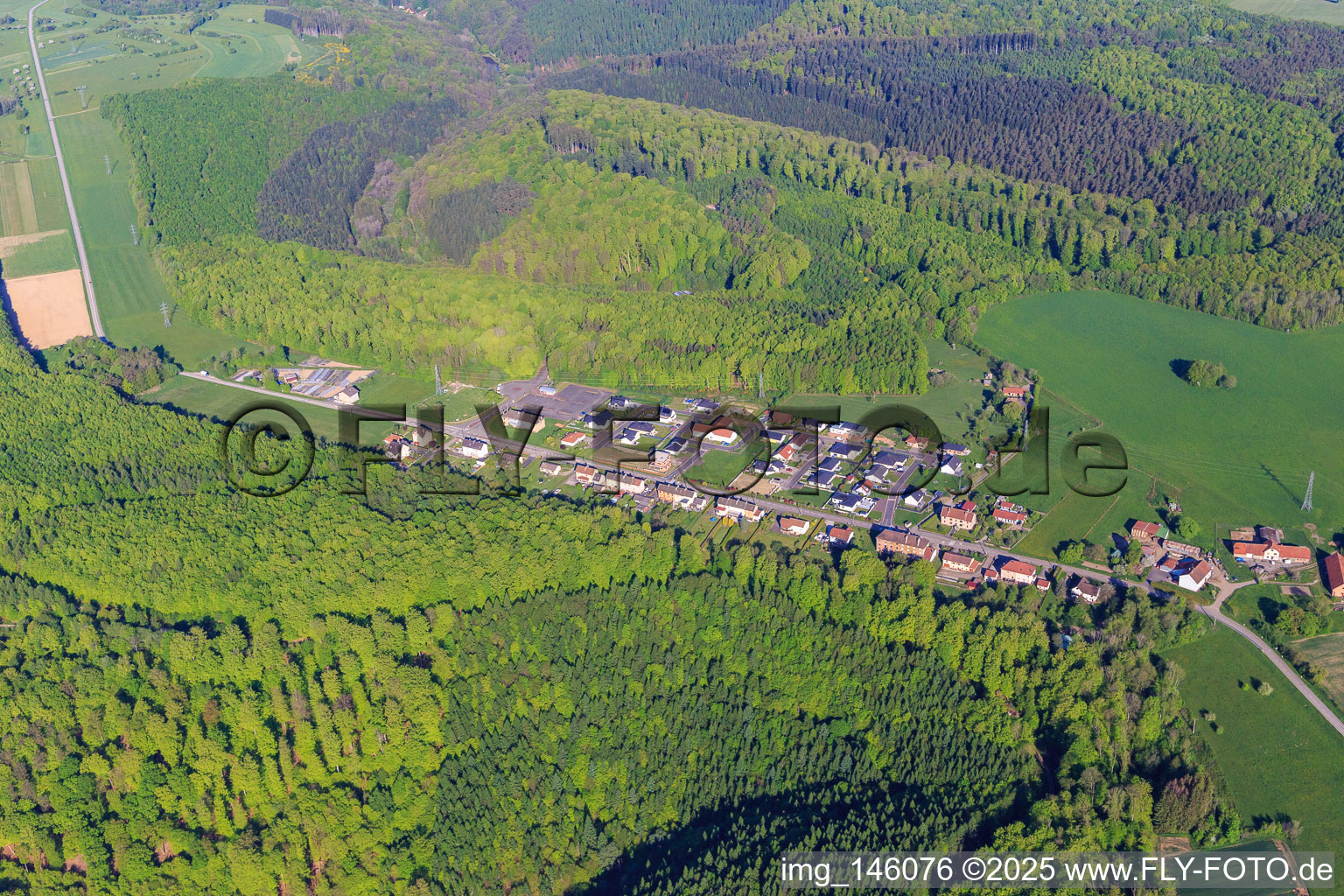 Village view with parking lot to Ouvrage Simserhof in Siersthal in the state Moselle, France
