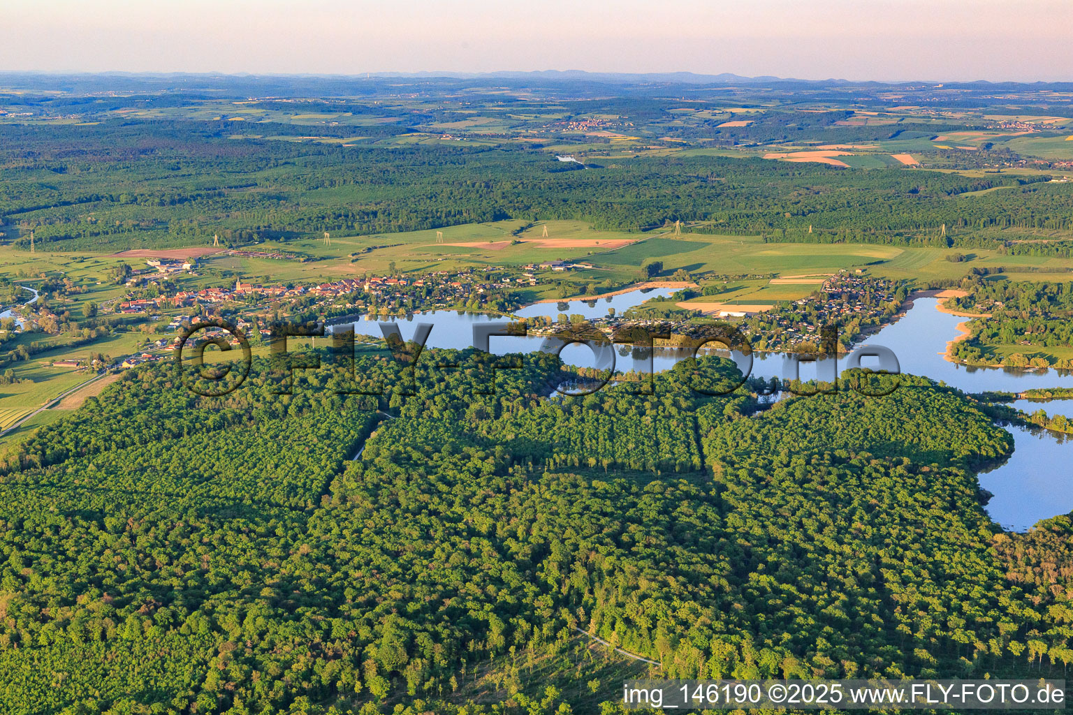 Aerial view of View of the town at Lake Mittersheim from the west in Mittersheim in the state Moselle, France