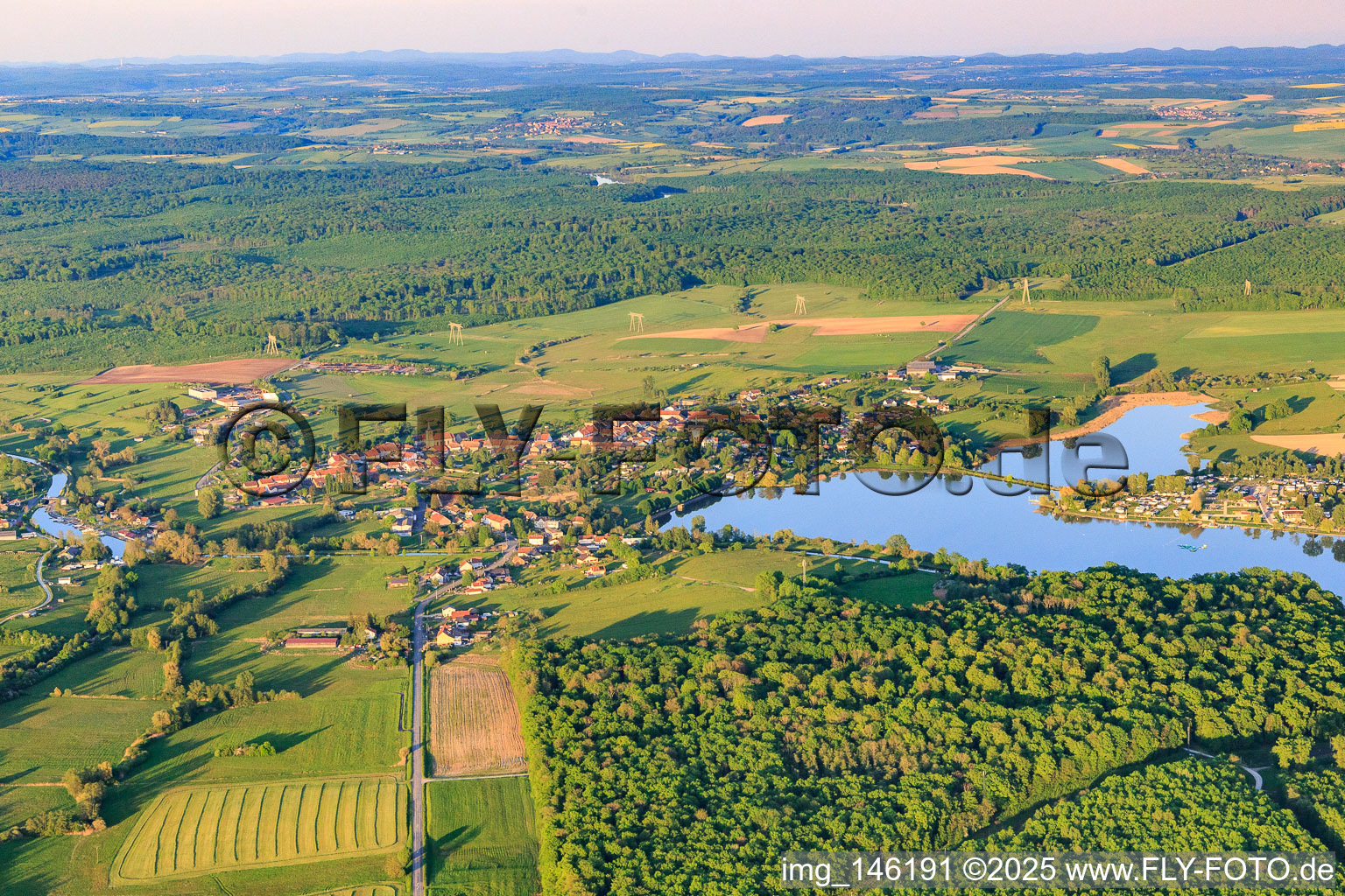 Aerial photograpy of View of the town at Lake Mittersheim from the west in Mittersheim in the state Moselle, France