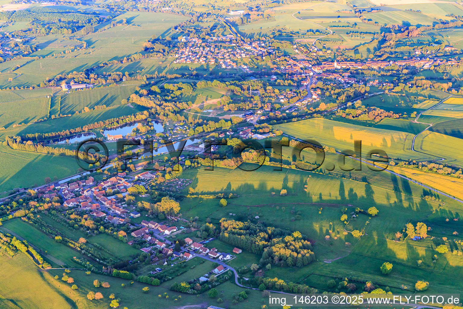 Village view on the Canal des houllères de la Sarre from the west in Bissert in the state Bas-Rhin, France