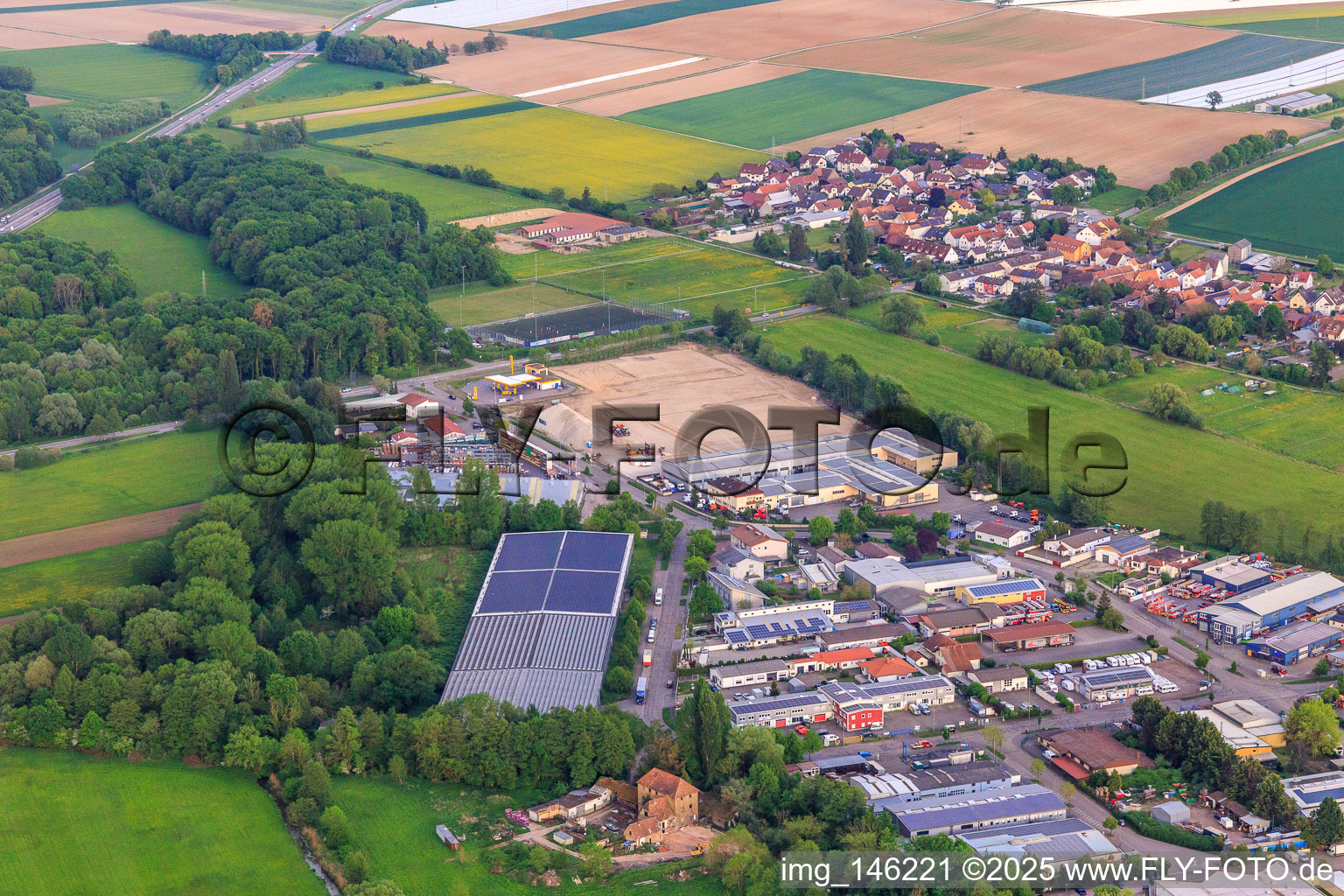 Aerial view of Construction site for the development of the new logistics park of HANSAINVEST and DFI-Real-Estate Kandel after demolition of the OBI market in the district Minderslachen in Kandel in the state Rhineland-Palatinate, Germany