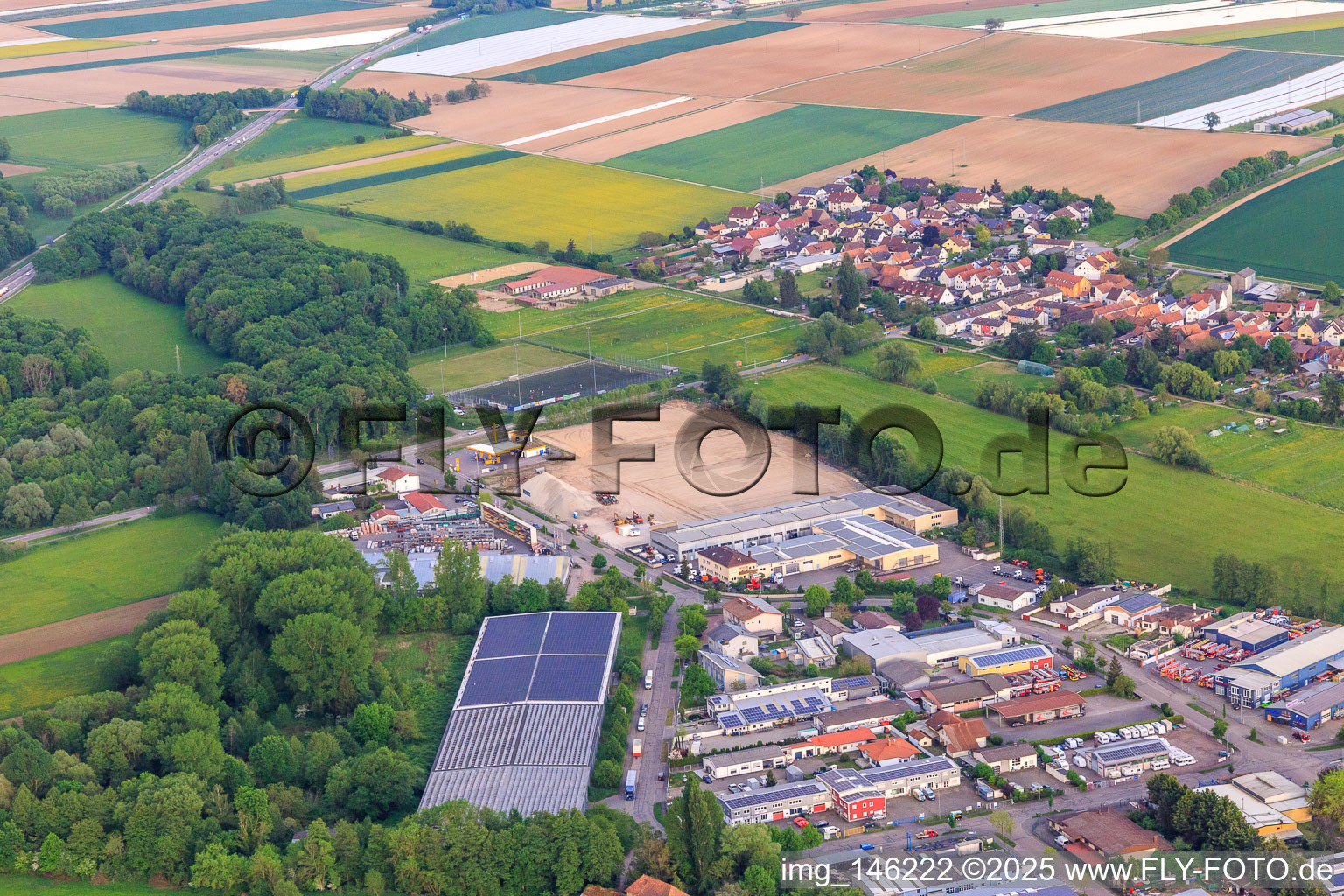 Aerial photograpy of Construction site for the development of the new logistics park of HANSAINVEST and DFI-Real-Estate Kandel after demolition of the OBI market in the district Minderslachen in Kandel in the state Rhineland-Palatinate, Germany