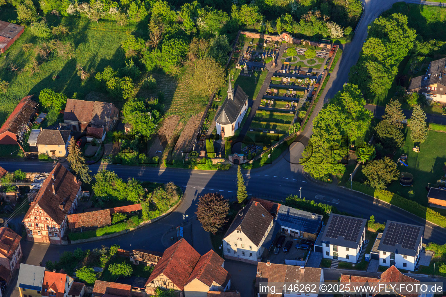 Aerial view of Cemetery Hochhausen with cemetery chapel St. Johann Baptist in the district Hochhausen in Tauberbischofsheim in the state Baden-Wuerttemberg, Germany