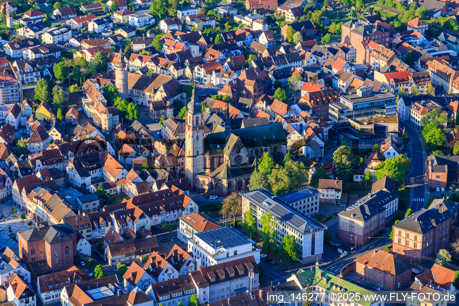 St. Martin's Church behind the Main-Tauber District Office with the Liebliches Taubertal Tourism Association in Tauberbischofsheim in the state Baden-Wuerttemberg, Germany