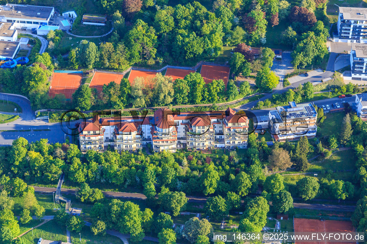 Luxury residential blocks on Erlenbachweg opposite the Rot-Weiß Bad Mergentheim eV tennis club next to Hotel-Restaurant Kippes in Bad Mergentheim in the state Baden-Wuerttemberg, Germany