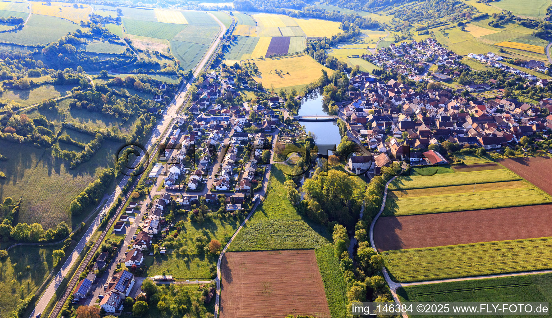 View of the town with Tauberstrand from the west in the district Elpersheim in Weikersheim in the state Baden-Wuerttemberg, Germany