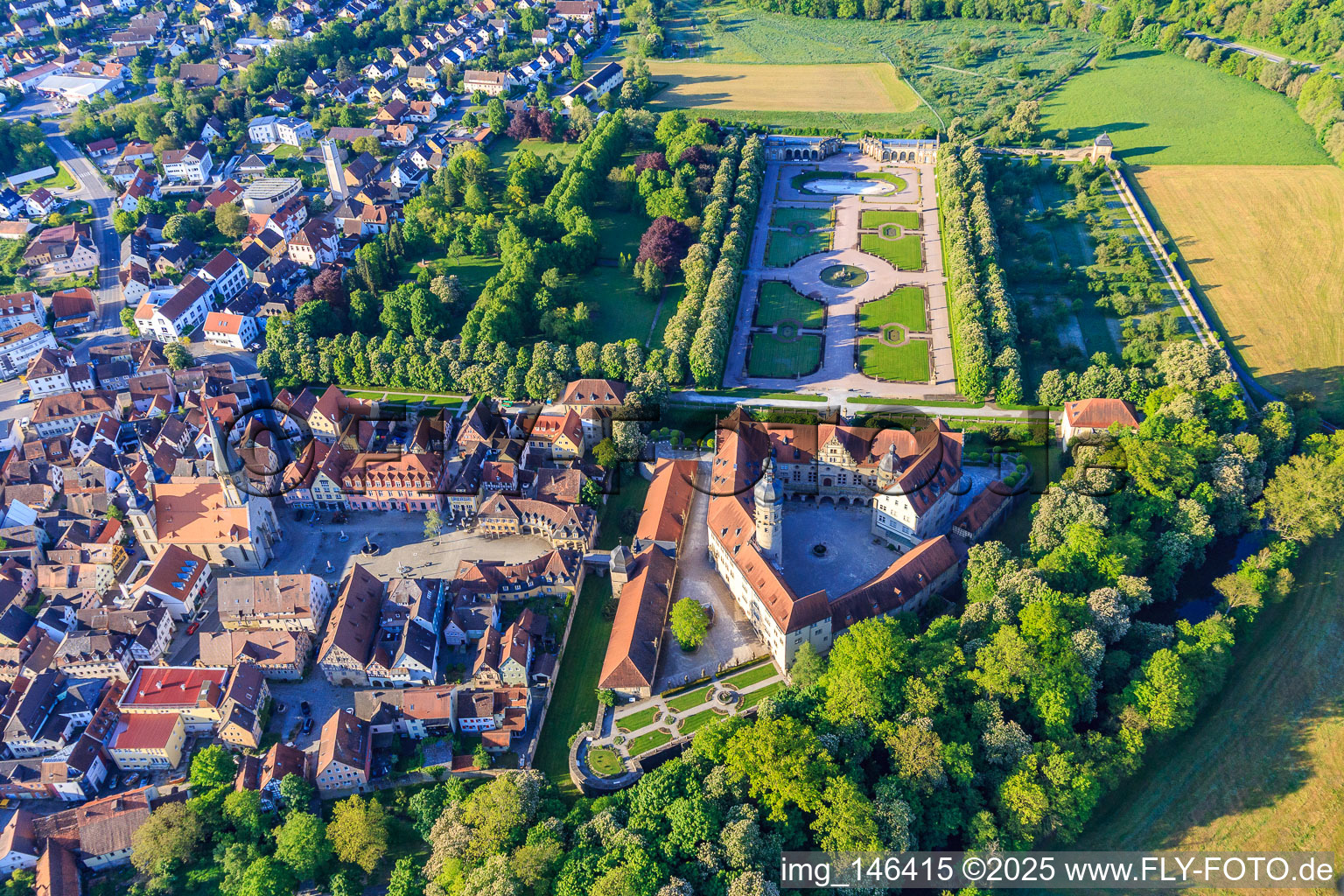 Castle and old town with St. George's Church on the market square, castle administration Weikersheim on the castle square in Weikersheim in the state Baden-Wuerttemberg, Germany