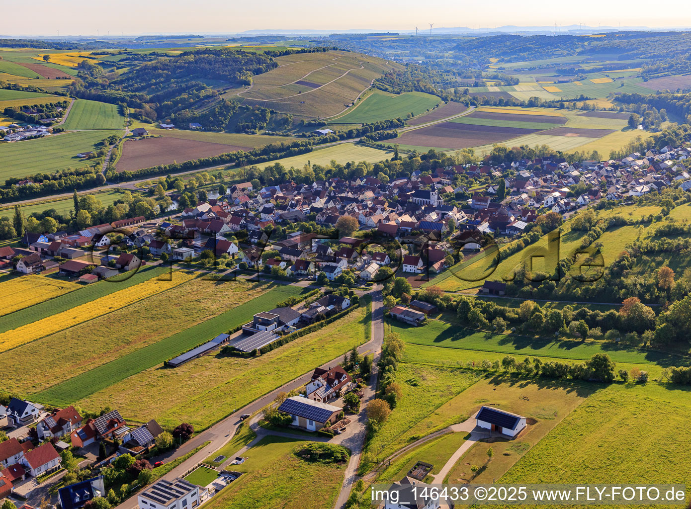 Village view in the lovely Taubertal from the southwest in the morning in Tauberrettersheim in the state Bavaria, Germany