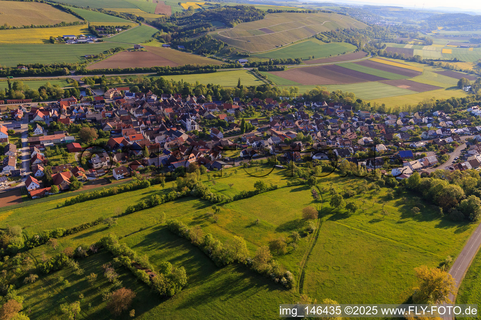 Aerial view of Village view in the lovely Taubertal from the southwest in the morning in Tauberrettersheim in the state Bavaria, Germany