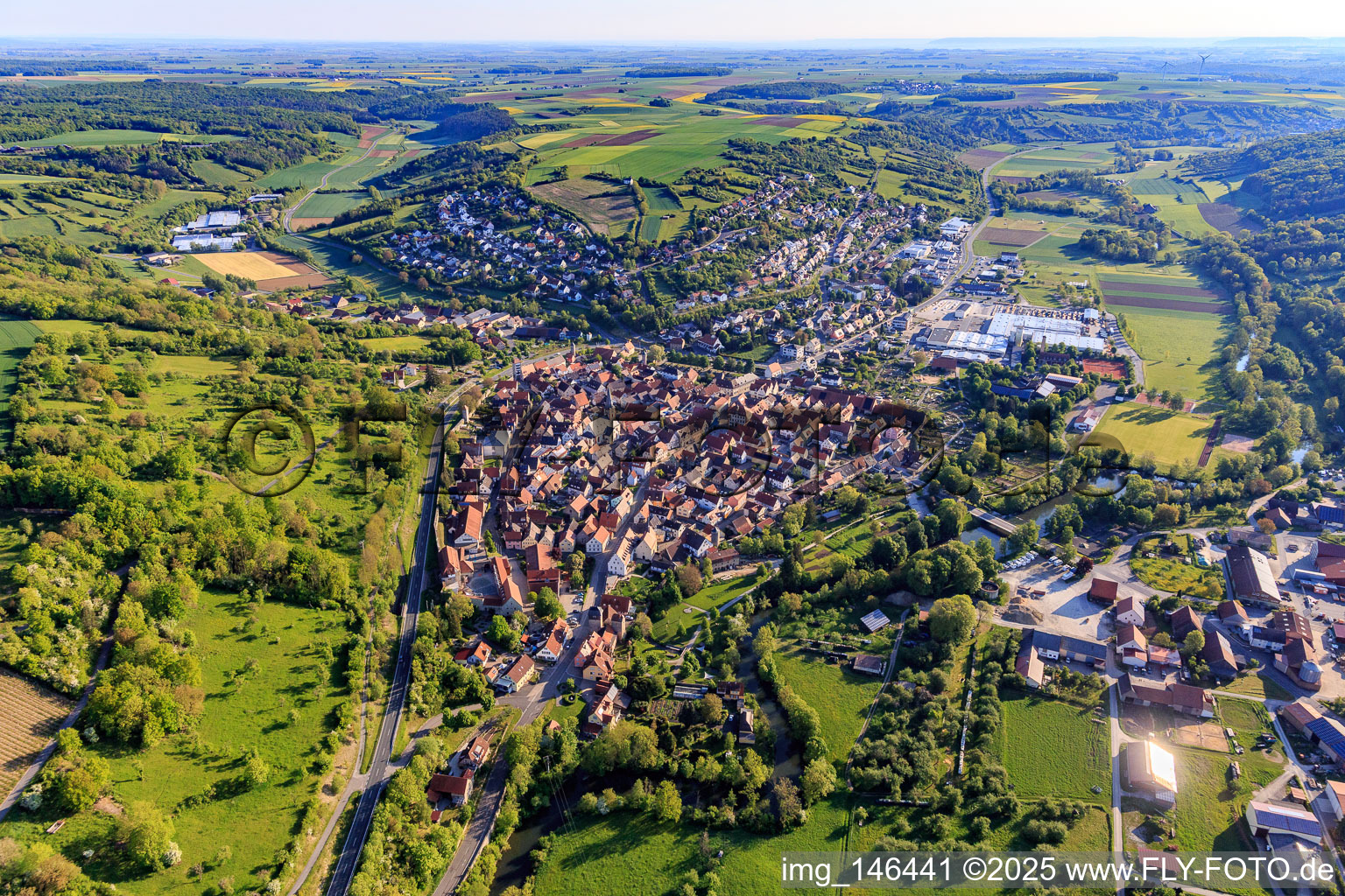 Village overview in the lovely Taubertal from the southwest in the morning in Röttingen in the state Bavaria, Germany