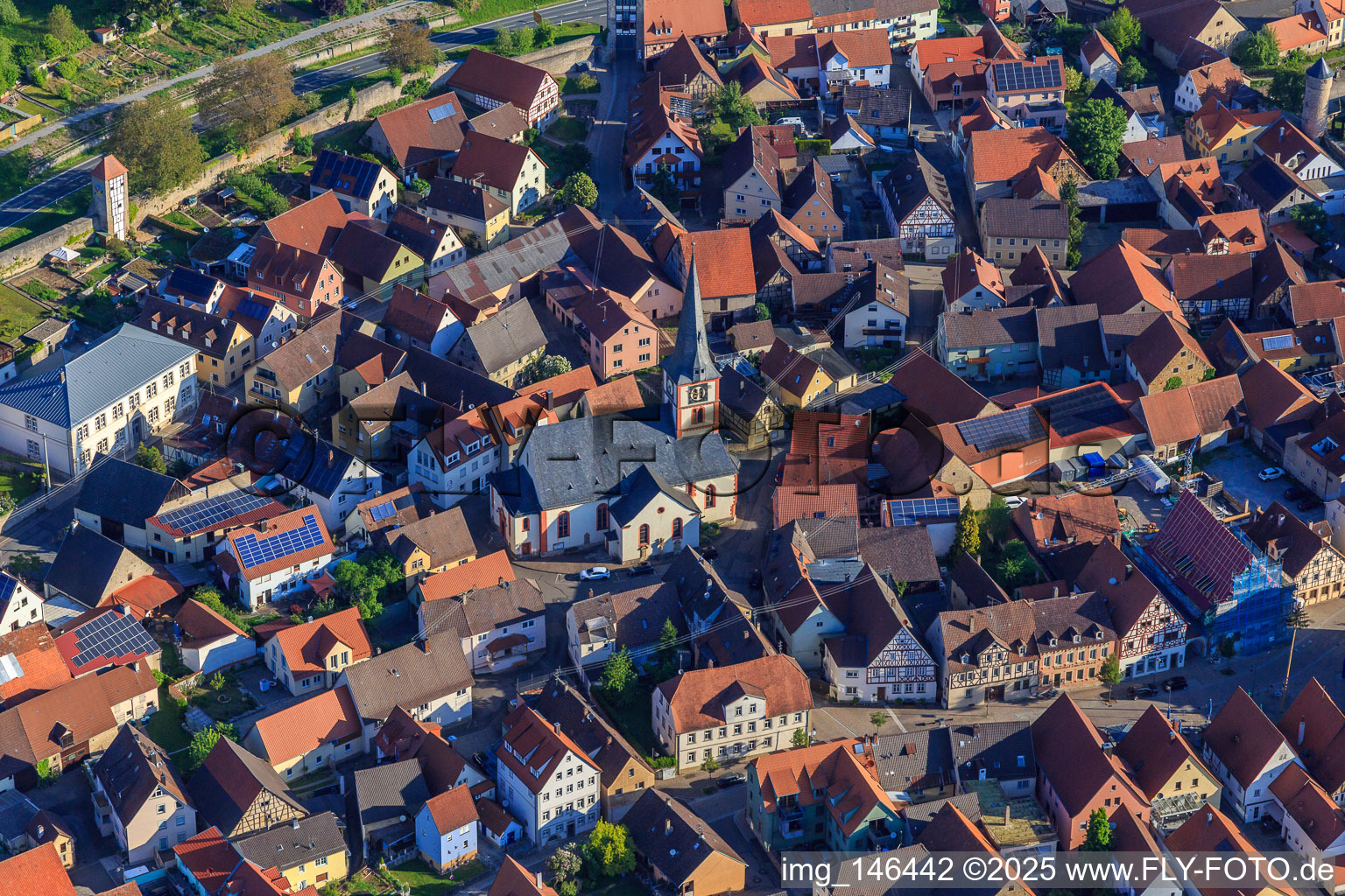 St. Kilian's Church in the village center in Röttingen in the state Bavaria, Germany