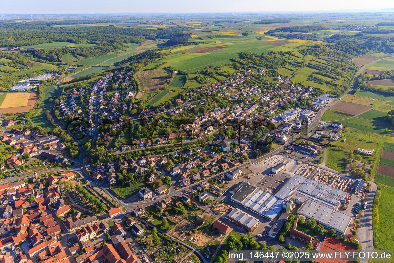 Village overview in the lovely Taubertal from the southeast in the morning in Röttingen in the state Bavaria, Germany