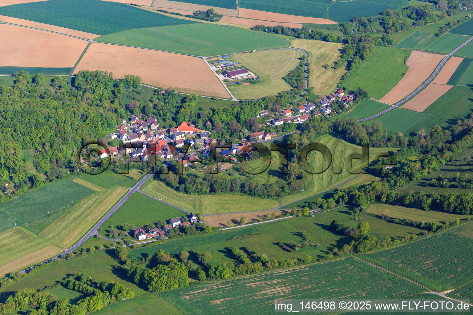 Village view in the morning from the south in the district Klingen in Bieberehren in the state Bavaria, Germany
