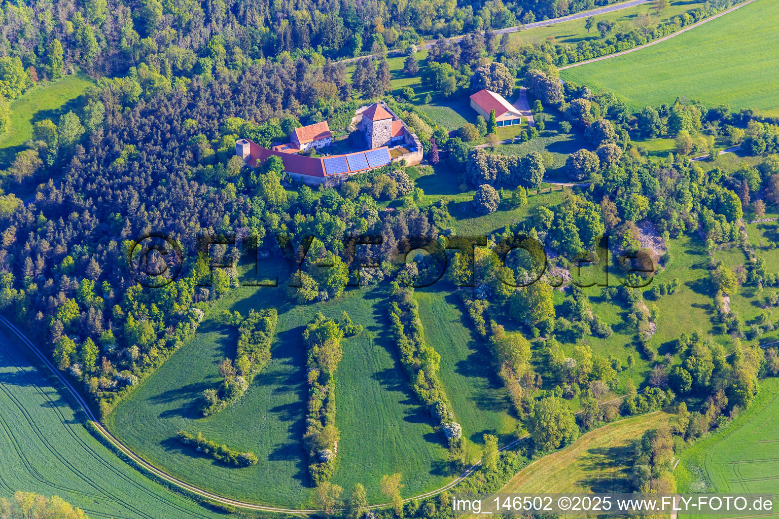 Aerial view of Brauneck Castle with photovoltaic roof in the district Niedersteinach in Creglingen in the state Baden-Wuerttemberg, Germany