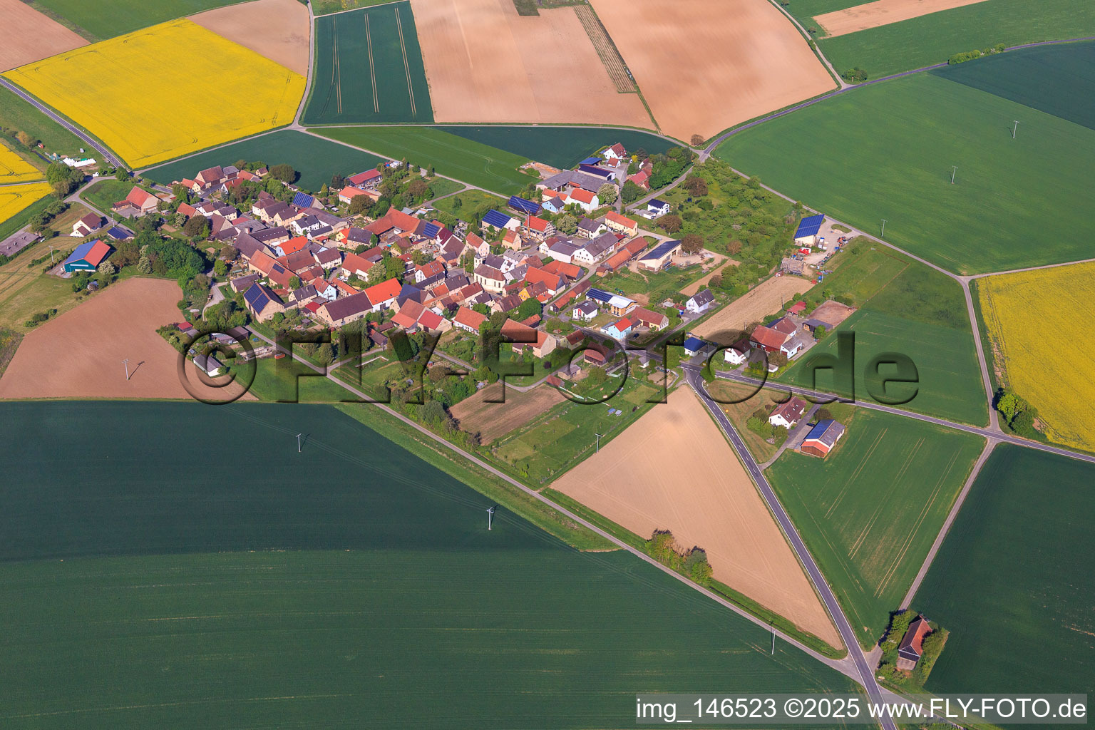 Village overview in the morning from the east in the district Oesfeld in Bütthard in the state Bavaria, Germany