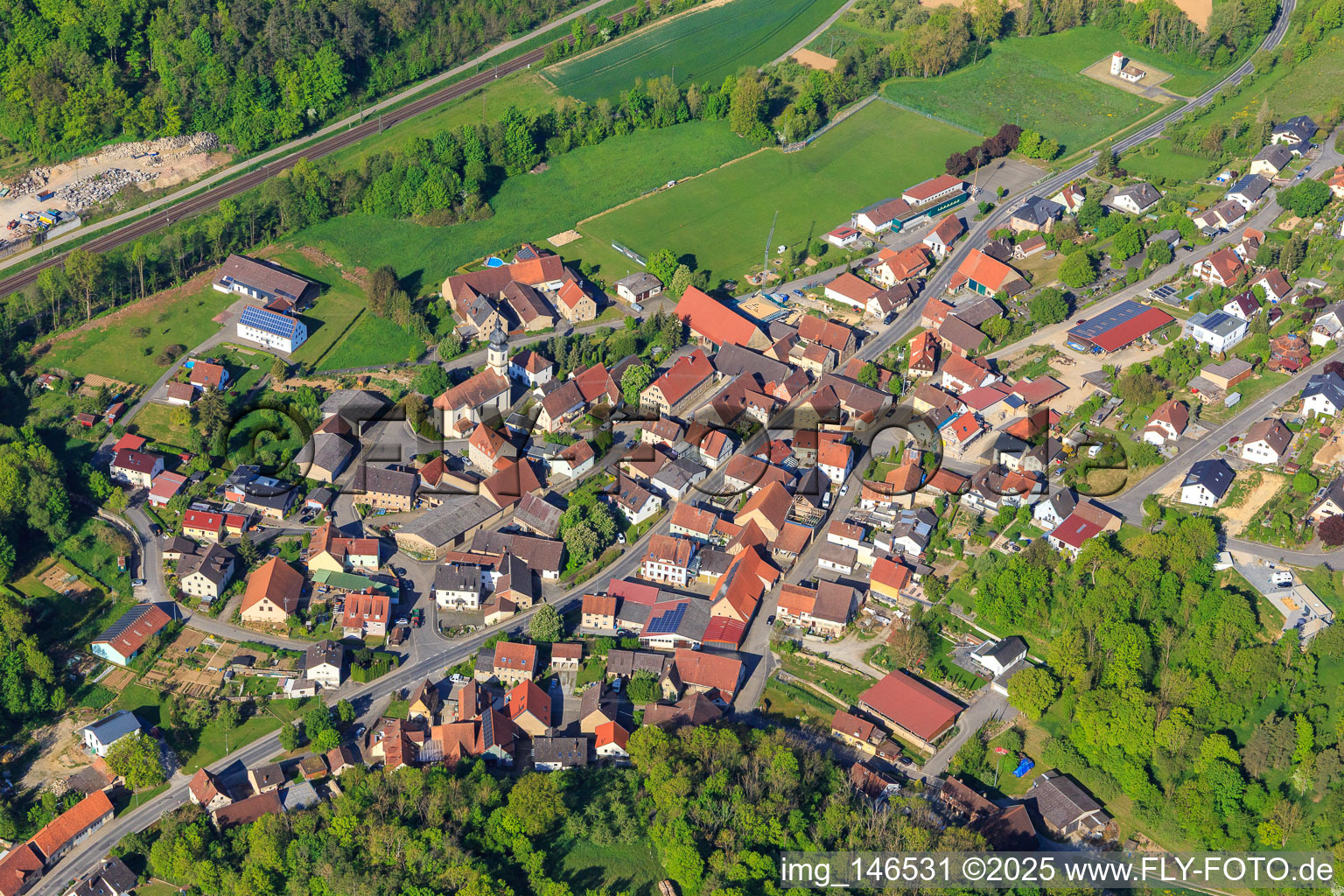 Village view with St. Margaretha Church in the district Zimmern in Grünsfeld in the state Baden-Wuerttemberg, Germany