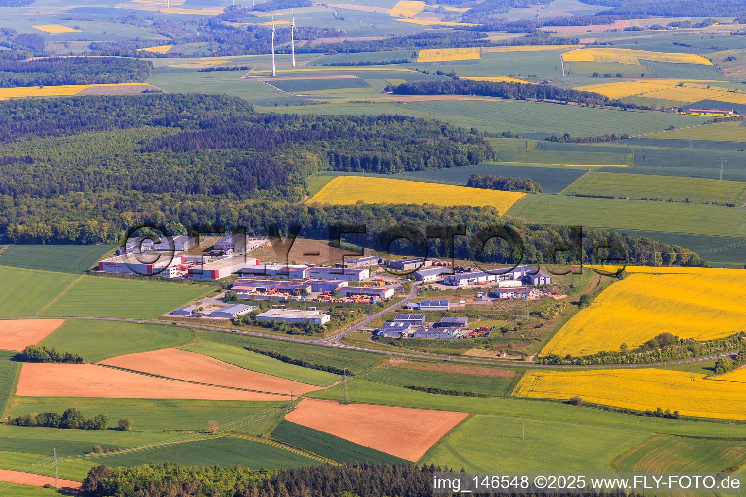 Industrial area on the A81 with recycling center Tauberbischofsheim A81, Alpha Techno Massagesessel GmbH, Michael Weinig AG and Spedition HEIN GmbH in Tauberbischofsheim in the state Baden-Wuerttemberg, Germany