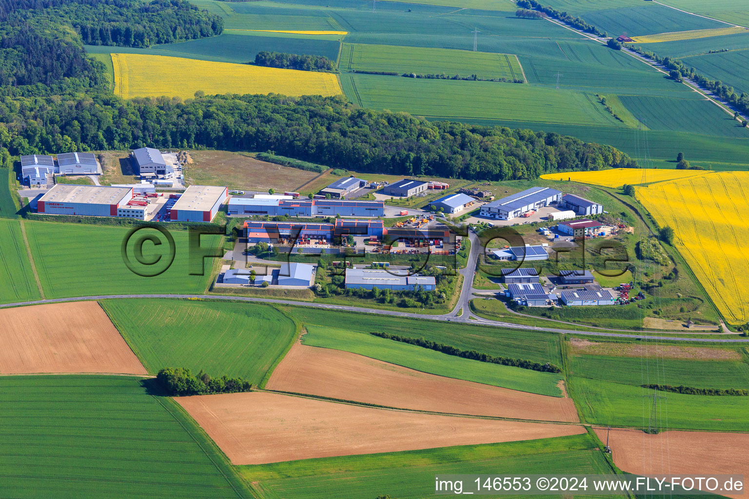 Aerial photograpy of Industrial area on the A81 with recycling center Tauberbischofsheim A81, Alpha Techno Massagesessel GmbH, Michael Weinig AG and Spedition HEIN GmbH in Tauberbischofsheim in the state Baden-Wuerttemberg, Germany