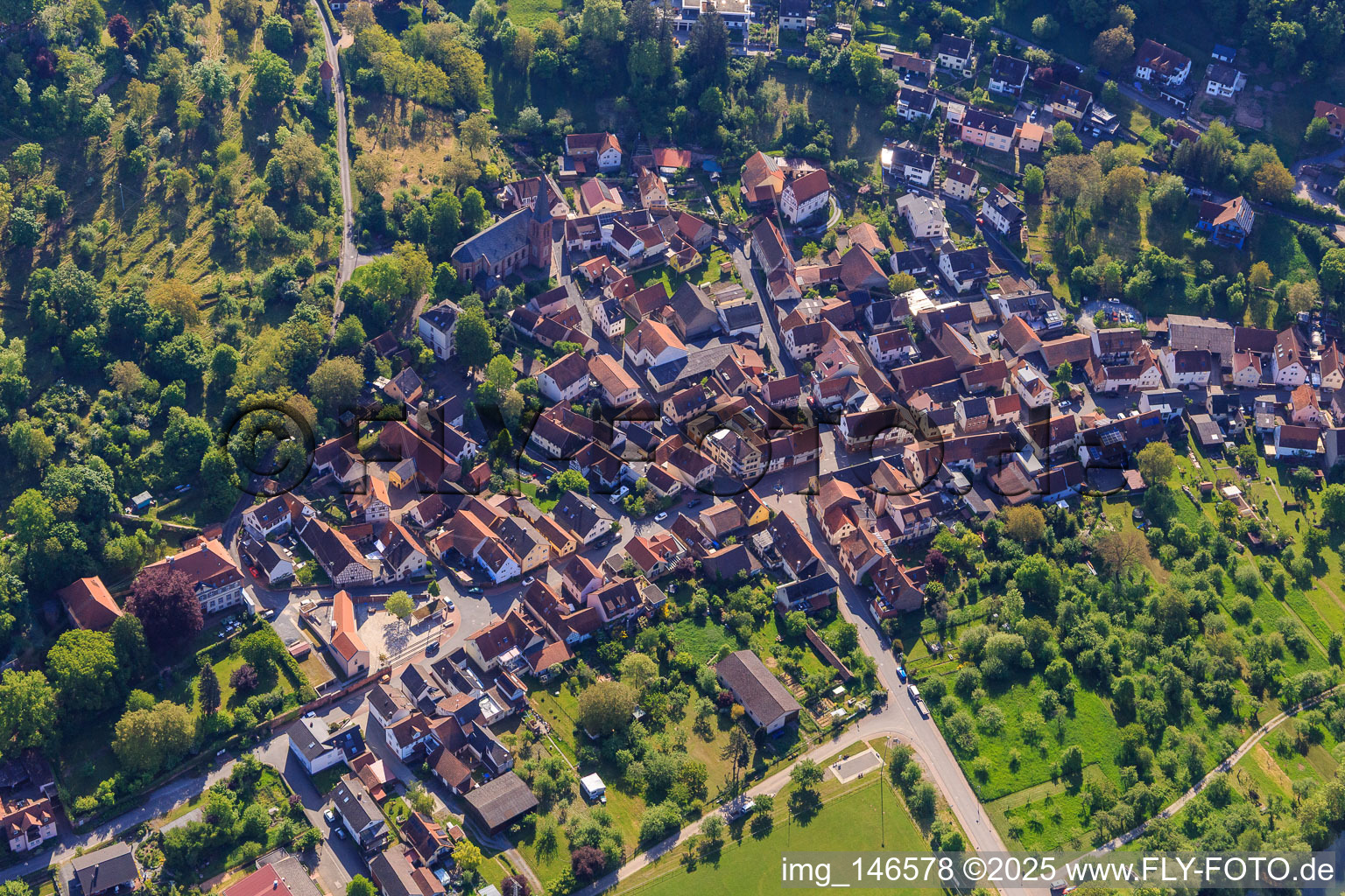 View of the village below the castle of the same name from the west in the district Gamburg in Werbach in the state Baden-Wuerttemberg, Germany