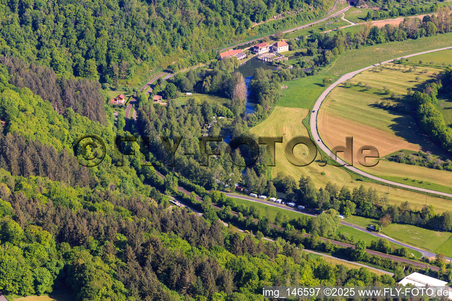 Camping Forelle on the banks of the Tauber in front of the Teilbach Mill in the district Reicholzheim in Wertheim in the state Baden-Wuerttemberg, Germany