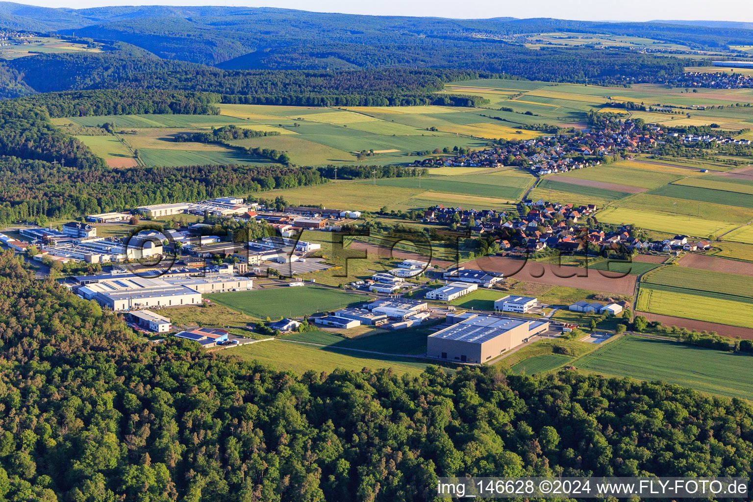 Frankenstraße industrial area with TAS GmbH Surface Technology and Kurtz Ersa Logistics GmbH in the district Wiebelbach in Kreuzwertheim in the state Bavaria, Germany