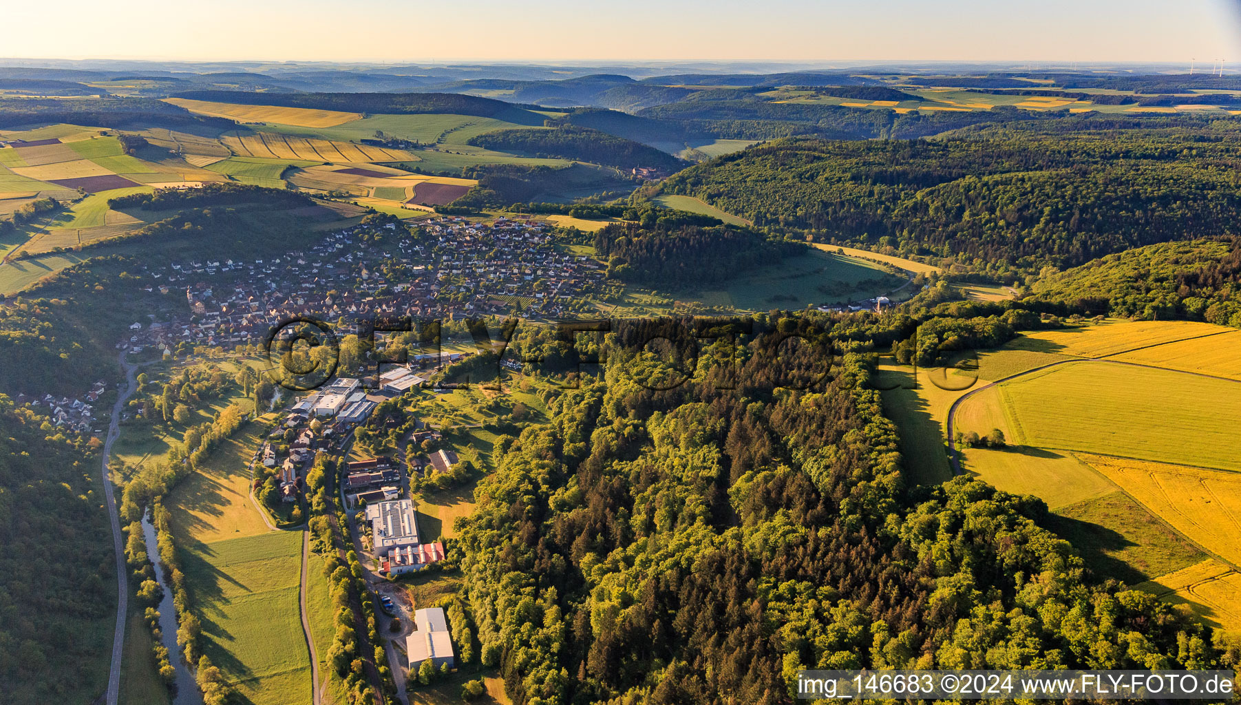 View of the town from the north in the morning with the industrial area Zum Schlag with Rekuplast GmbH, Uebe Medical GmbH and TFA Dostmann GmbH & Co. KG in the district Reicholzheim in Wertheim in the state Baden-Wuerttemberg, Germany